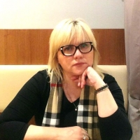 Натали Коржак